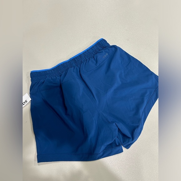 Saucony Women's M Medium Outpace 5" Shorts Indigo Blue NWT Pockets Lightweight - Picture 2 of 14